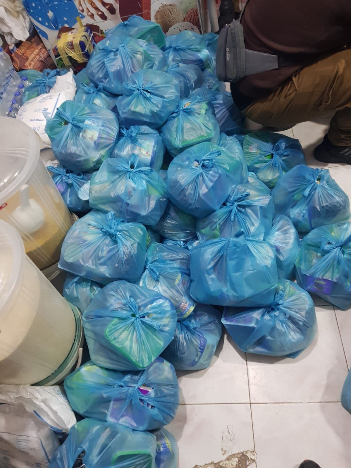 Founders of Rebuild & Renew Foundation with community members